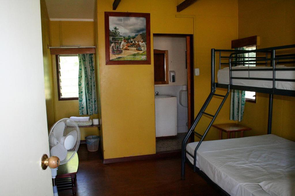 Ratu Kini Backpackers And Dive Resort Île de Mana Chambre photo