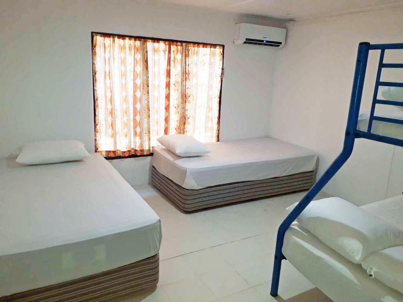 Ratu Kini Backpackers And Dive Resort Île de Mana Extérieur photo